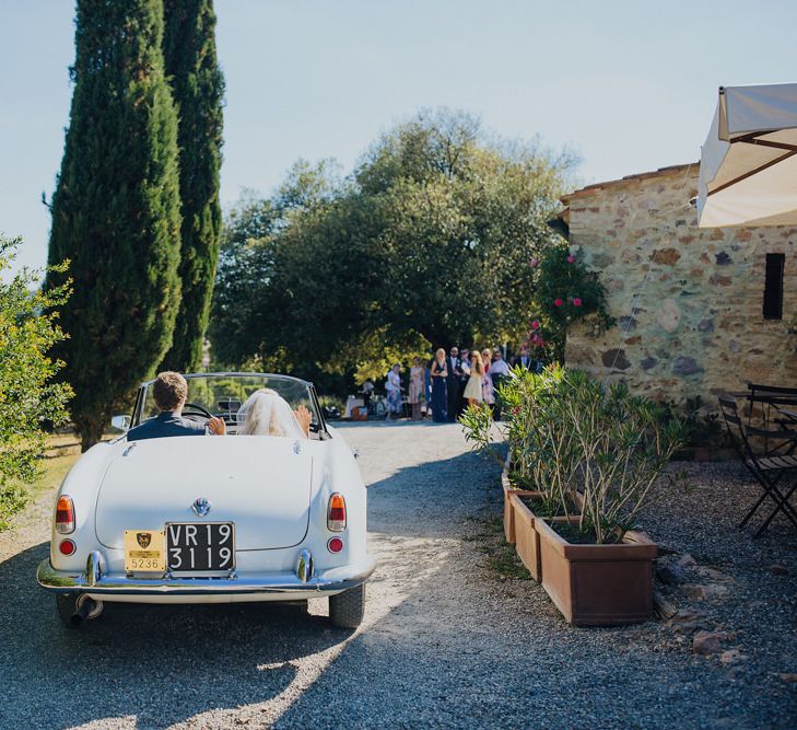 Bride in Justin Alexander Wedding Dress | Groom in Gresham Blake Suit | Outdoor Destination wedding in the Tuscan Hills at Villa Podernovo, near Siena | Lush Imaging | Mrs Mash Up Films