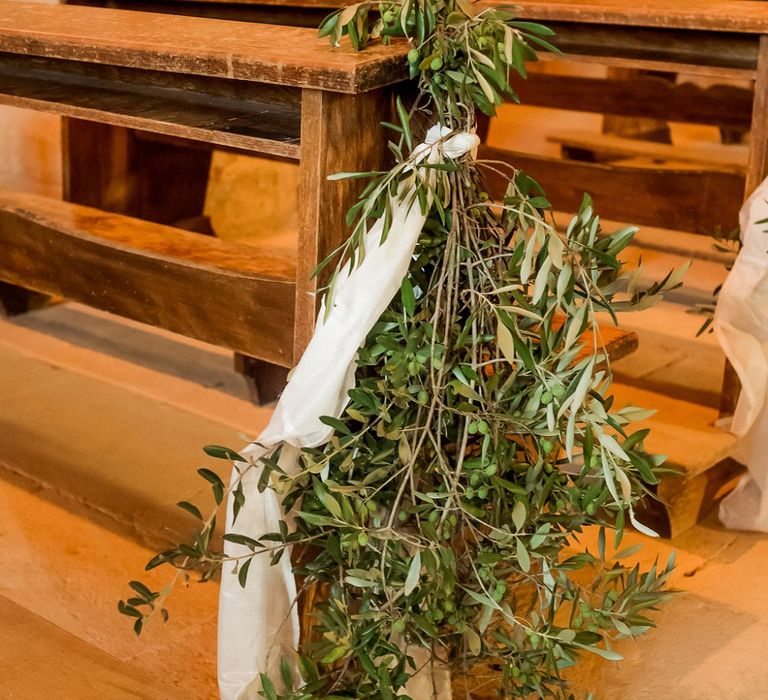 Olive Leave Pew End Wedding Decor | Destination Wedding at Pienza, Italy | Nordica Photography