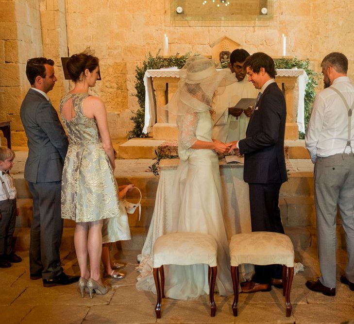 Wedding Ceremony | Bride in Low Back Atelier Endeavour Gown | Groom in Hugo Boss Suit | Destination Wedding at Pienza, Italy | Nordica Photography