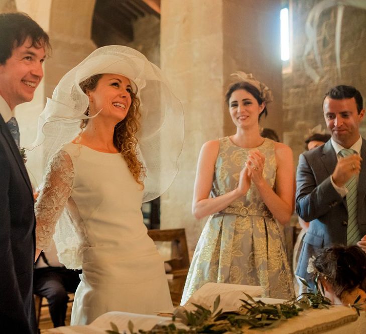 Wedding Ceremony | Bride in Low Back Atelier Endeavour Gown | Groom in Hugo Boss Suit | Destination Wedding at Pienza, Italy | Nordica Photography