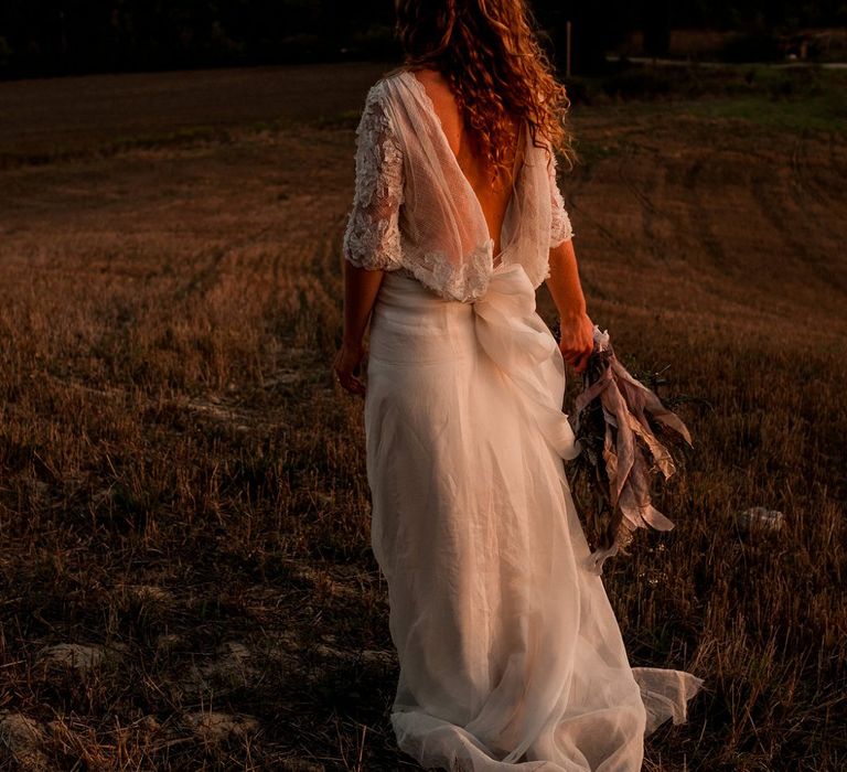 Bride in Low Back Atelier Endeavour Gown | Destination Wedding at Pienza, Italy | Nordica Photography