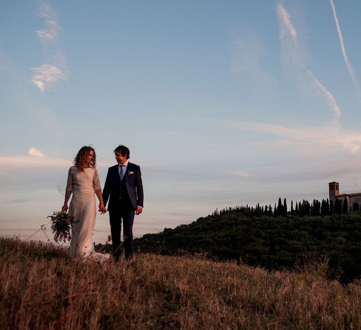 Bride in Low Back Atelier Endeavour Gown | Groom in Hugo Boss Suit | Destination Wedding at Pienza, Italy | Nordica Photography