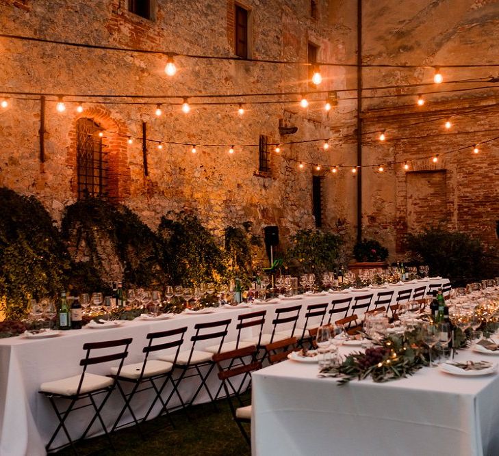 Festoon Light Outdoor Reception | Destination Wedding at Pienza, Italy | Nordica Photography