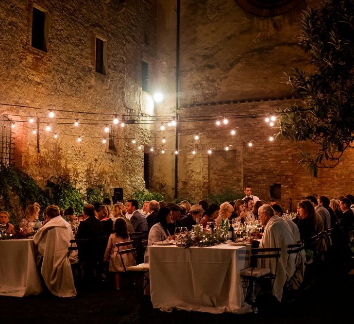 Festoon Light Outdoor Reception | Destination Wedding at Pienza, Italy | Nordica Photography