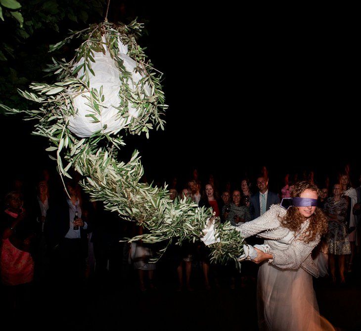 Piñata | Bride in Low Back Atelier Endeavour Gown | Destination Wedding at Pienza, Italy | Nordica Photography