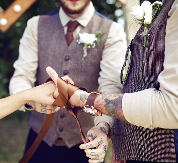 Hand FasteningOutdoor Wedding Ceremony at Wood Farm | Vintage Weddings Photography