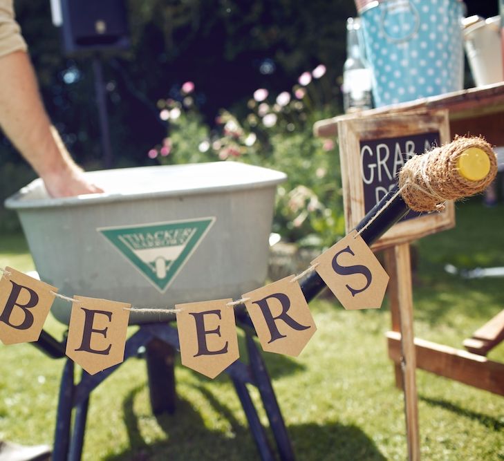 Beer Wheel Barrow | Outdoor Wedding Ceremony at Wood Farm | Vintage Weddings Photography