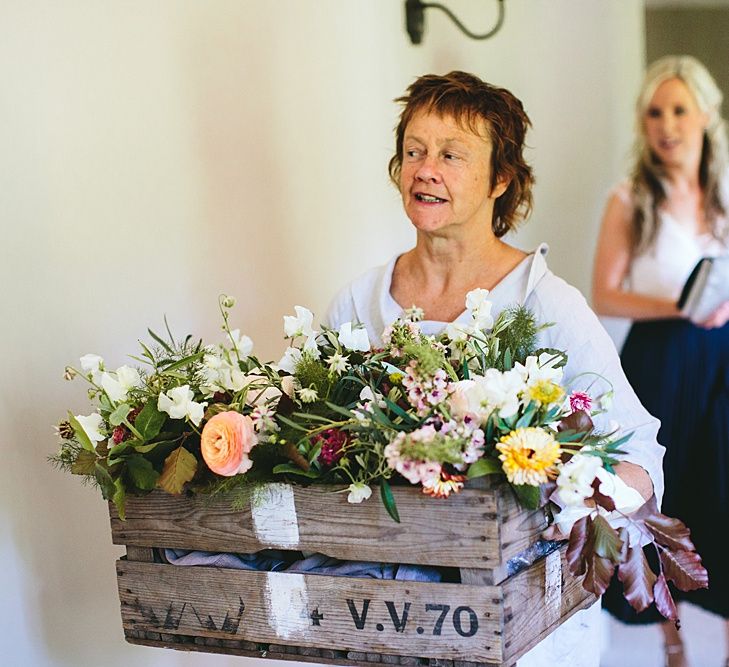 Wooden Crate of Wild Flower Bouquets | At Home Greenery Filled Marquee Wedding in Yorkshire | Craig Williams Photography