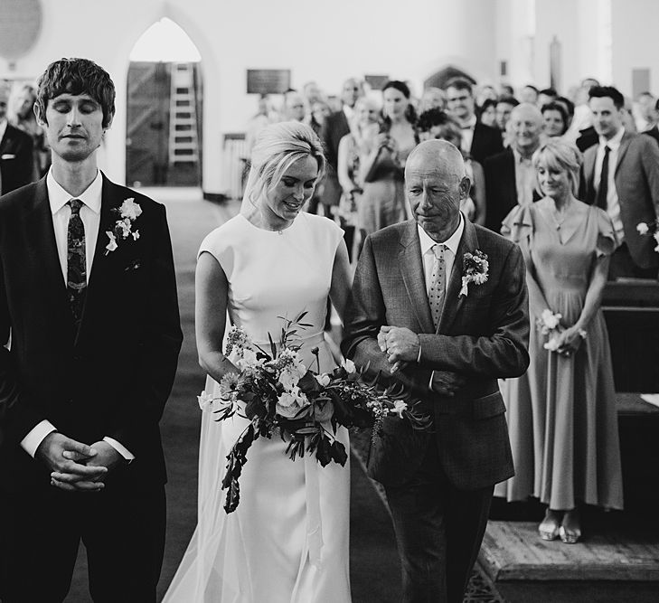 Wedding Ceremony | Bride in Bon Bride Bespoke Gown | Groom in Navy Paul Smith Suit | At Home Greenery Filled Marquee Wedding in Yorkshire | Craig Williams Photography