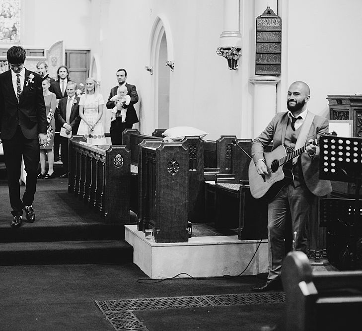 Wedding Ceremony | Bride in Bon Bride Bespoke Gown | Groom in Navy Paul Smith Suit | At Home Greenery Filled Marquee Wedding in Yorkshire | Craig Williams Photography