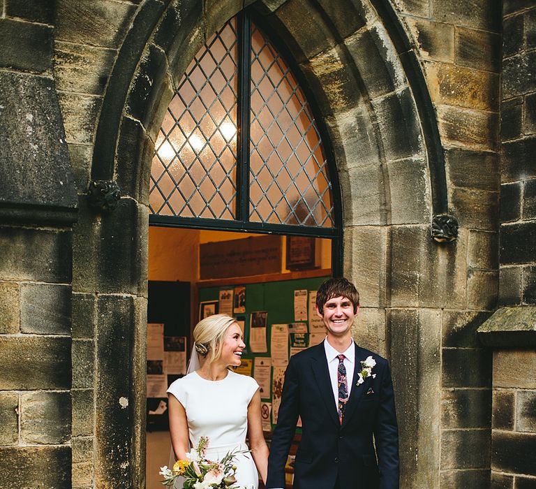 Wedding Ceremony | Bride in Bon Bride Bespoke Gown | Groom in Navy Paul Smith Suit | At Home Greenery Filled Marquee Wedding in Yorkshire | Craig Williams Photography