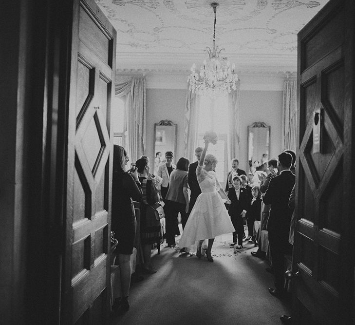 Wedding Ceremony at Ruston Hall Northamptonshire | Stylish Bride in Separates by Noble and Wright | Groom in Folk Suit | Marshal Gray Photography