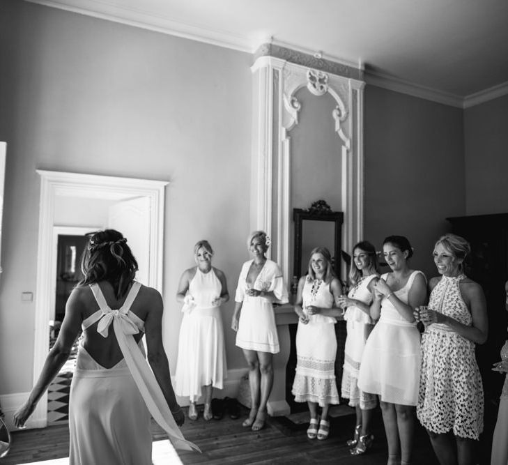 Bridesmaids In White Dresses From The High Street For A Valentino Rockstud Wedding Shoes For A Relaxed Intimate Wedding At Chateau De Lisse France With Bride In Delphine Manivet From The Mews Bridal With Images From McGivern Photography