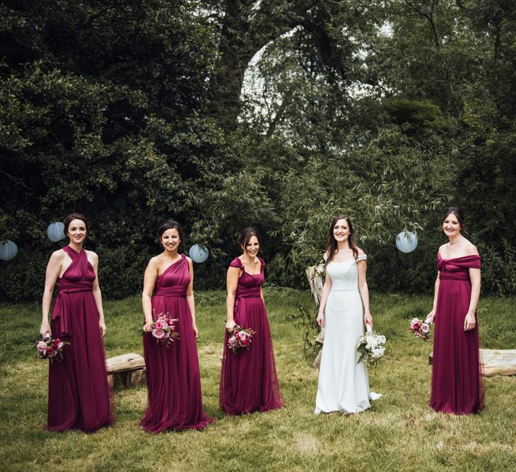 Raspberry, Gold & Navy Colour Palette Marquee Wedding With Suzanne Neville Bride & Bridesmaids In Raspberry Multiway Dresses Images From Michelle Wood