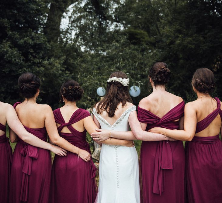 Raspberry, Gold & Navy Colour Palette Marquee Wedding With Suzanne Neville Bride & Bridesmaids In Raspberry Multiway Dresses Images From Michelle Wood