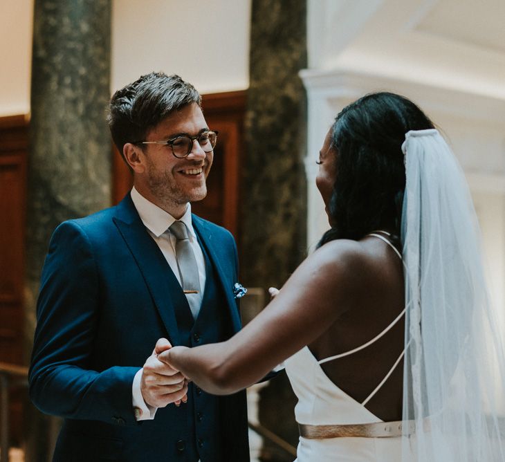 First Look | Bride in Charlie Brear | Groom in Moss Bros Suit | Botanical Orangery Wedding at Horniman Museum & Gardens, London | Fern Edwards Photography