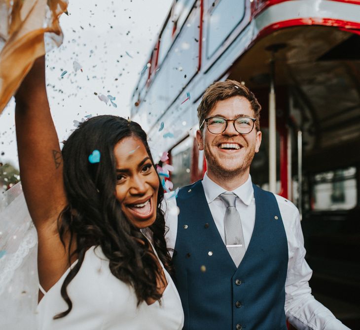 Bride in Charlie Brear Gown | Groom in Moss Bros Suit | London Bus Wedding Transport | Botanical Orangery Wedding at Horniman Museum & Gardens, London | Fern Edwards Photography