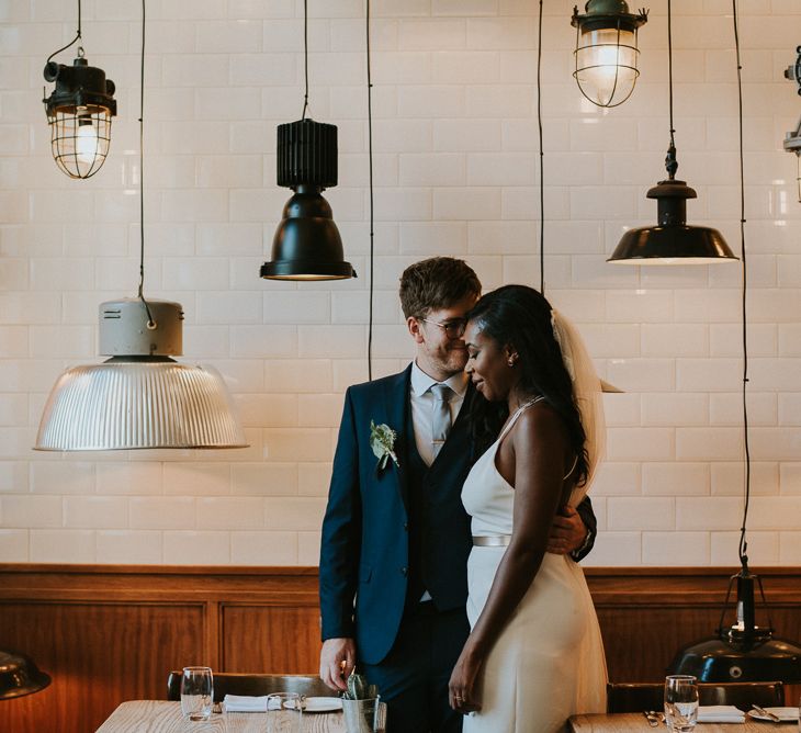 Bride in Charlie Brear | Groom in Moss Bros Suit | City Wedding at Town Hall Hotel, Bethnal Green | Fern Edwards Photography