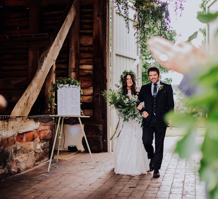 Bride in Needle & Thread Gown | Greenery Flower Crown | Groom in Ted Baker Suit | Rustic, Greenery Wedding at Pimhill Barns Shropshire | Clara Cooper Photography | Second Shooter Helen Jane Smiddy Photography