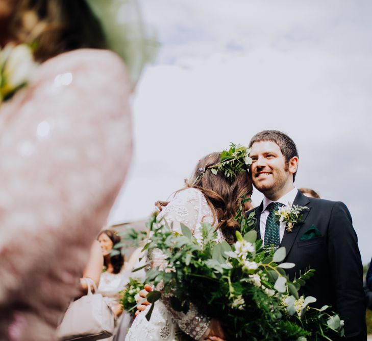 Bride in Needle & Thread Gown | Greenery Flower Crown | Groom in Ted Baker Suit | Rustic, Greenery Wedding at Pimhill Barns Shropshire | Clara Cooper Photography | Second Shooter Helen Jane Smiddy Photography