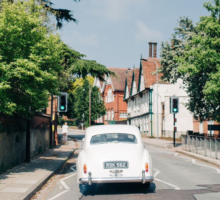 Wedding Car | Image by <a href="https://www.mandjphotos.com/" target="_blank">M&J Photography</a>