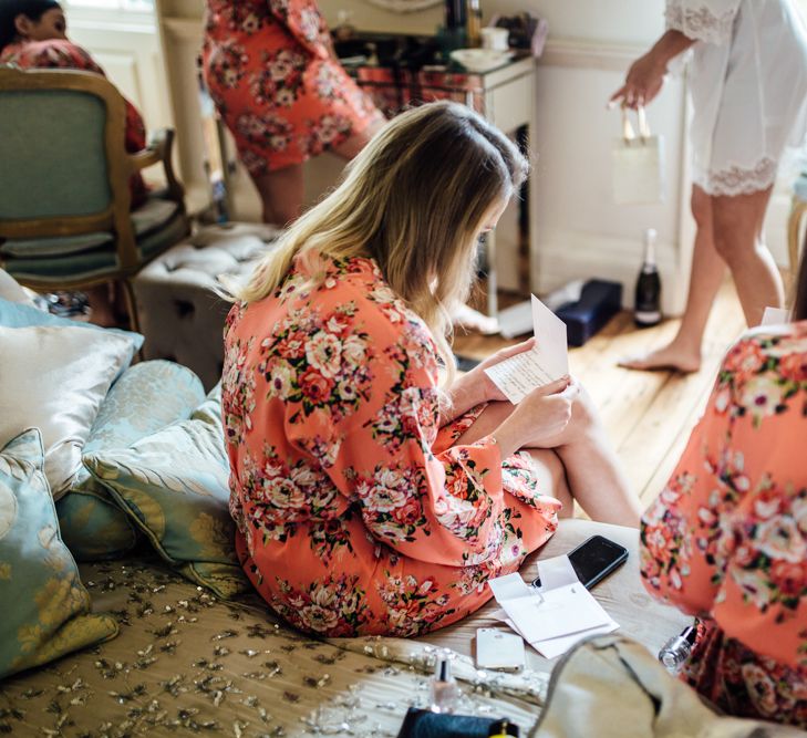 Bridesmaids Getting Ready In Floral Robes