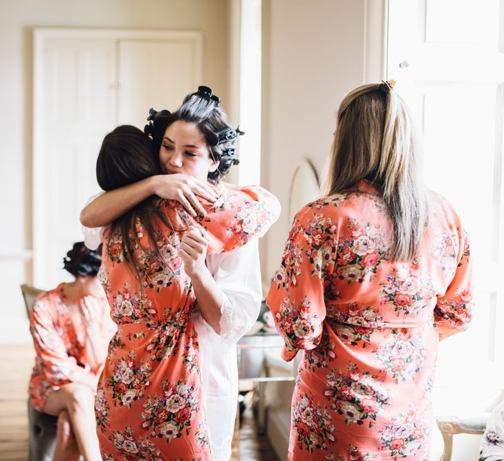 Bridesmaids Getting Ready In Floral Robes