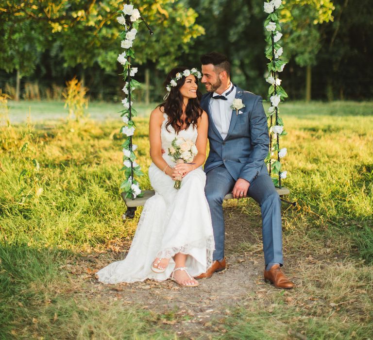 Bride & Groom On Swing