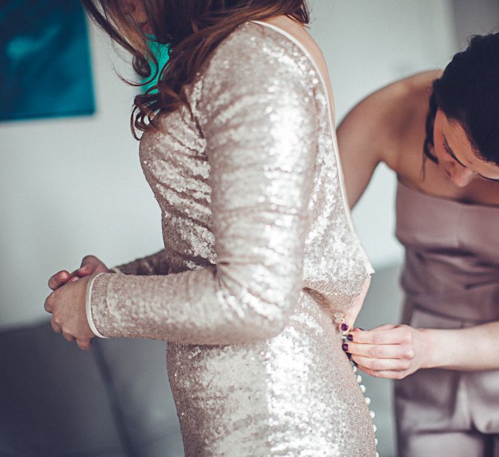 Bride In Gold Sequinned Dress For A Relaxed Wedding At Asylum Chapel With Bridesmaids In Mismatched High Street Dresses And Images by Lovestruck Photography