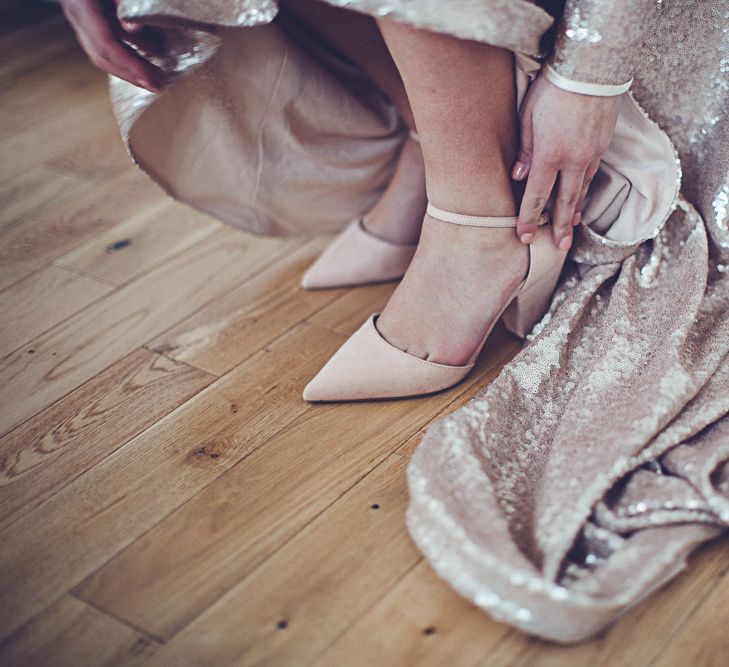 Bride In Gold Sequinned Dress For A Relaxed Wedding At Asylum Chapel With Bridesmaids In Mismatched High Street Dresses And Images by Lovestruck Photography