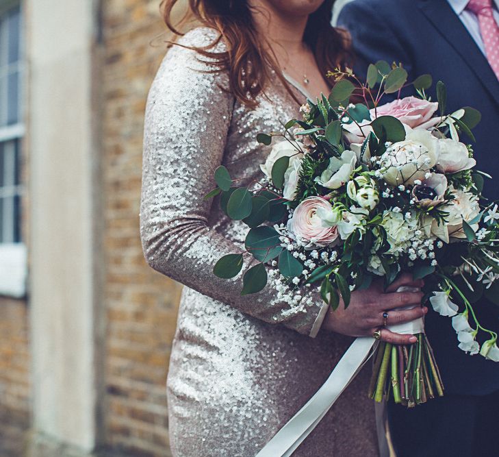 Bride In Gold Sequinned Dress For A Relaxed Wedding At Asylum Chapel With Bridesmaids In Mismatched High Street Dresses And Images by Lovestruck Photography