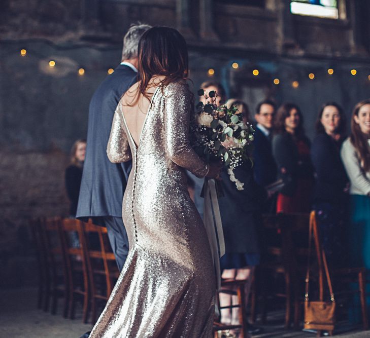 Bride In Gold Sequinned Dress For A Relaxed Wedding At Asylum Chapel With Bridesmaids In Mismatched High Street Dresses And Images by Lovestruck Photography