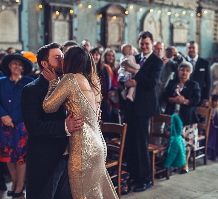 Bride In Gold Sequinned Dress For A Relaxed Wedding At Asylum Chapel With Bridesmaids In Mismatched High Street Dresses And Images by Lovestruck Photography