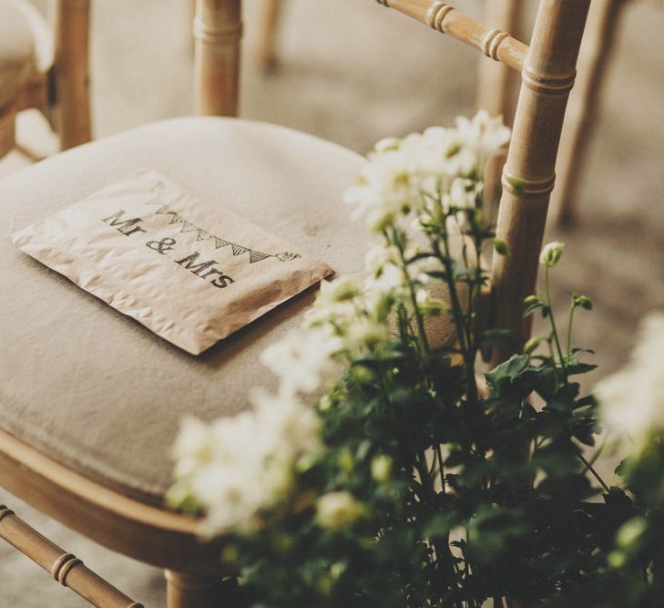 Brown Paper Confetti Bags on Ceremony Chairs