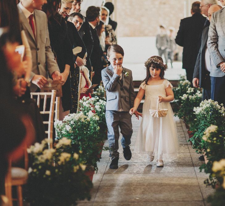 Flower Girl & Page Boy Walking up the Wild Flower & Greenery Aisle