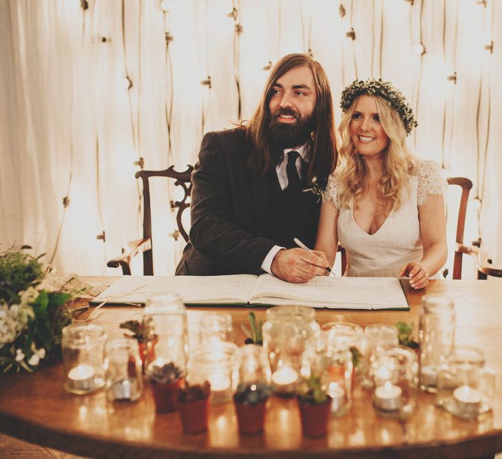 Bride & Groom Signing The Register