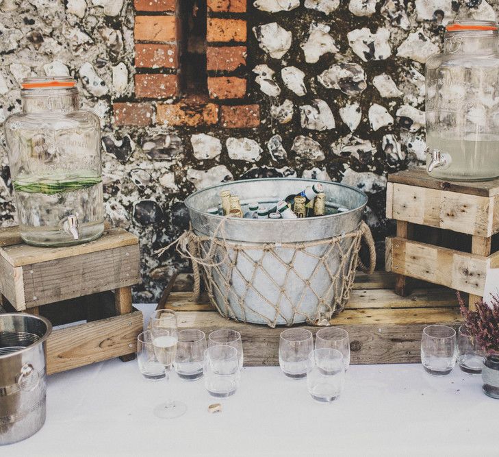 Drinks Dispensers on Wooden Crates