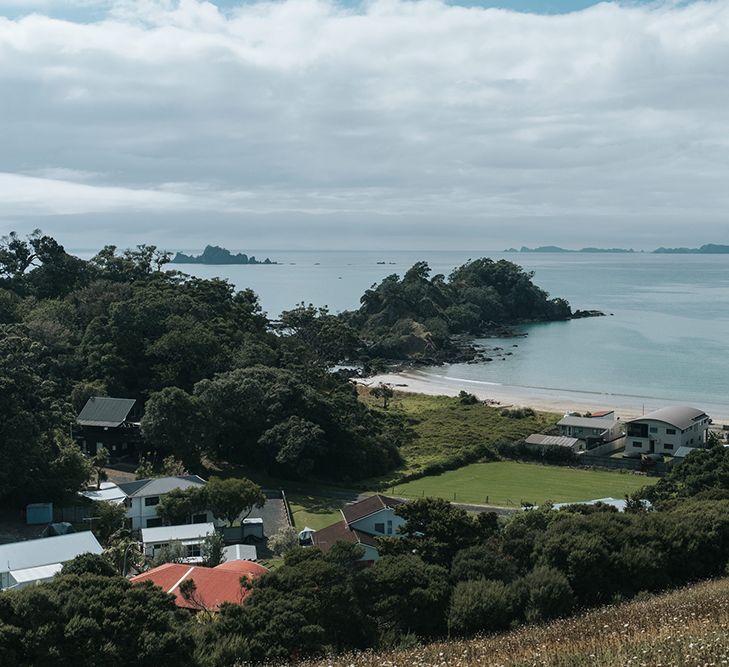 Outdoor Coastal Wedding at Ohawini Bay in New Zealand with Natural Garden Party Reception | Miss Gen Photography