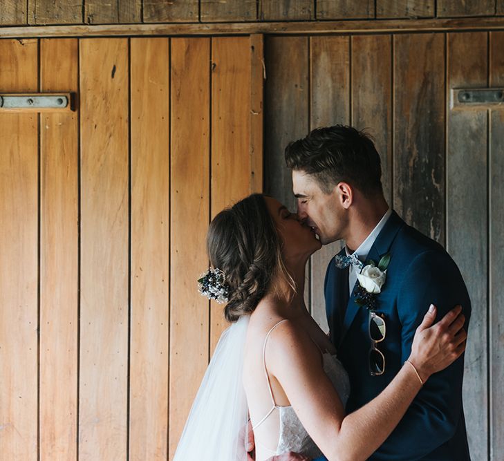 First Look | Bride in Sally Eagle 'Estelle' Gown | Groom in Chinos & Blazer | Outdoor Coastal Wedding at Ohawini Bay in New Zealand with Natural Garden Party Reception | Miss Gen Photography