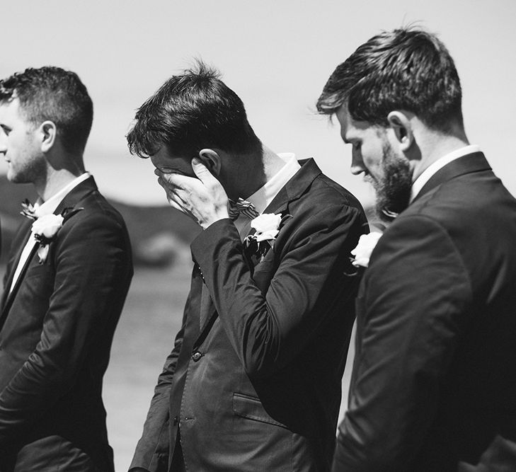 Wedding Ceremony | Groomsmen in Grey Chinos & Navy Blazers | Outdoor Coastal Wedding at Ohawini Bay in New Zealand with Natural Garden Party Reception | Miss Gen Photography