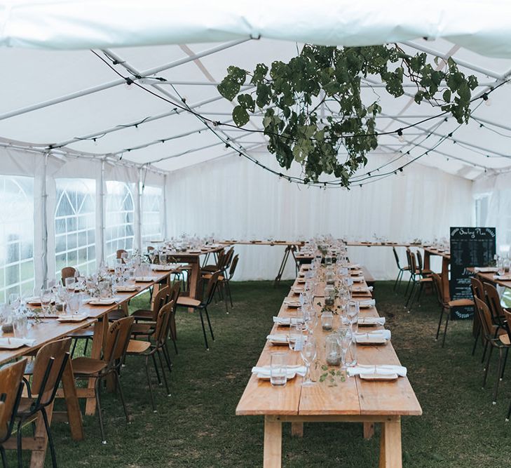 Marquee Reception with Wood, Greenery & Festoon Light Decor | Outdoor Coastal Wedding at Ohawini Bay in New Zealand with Natural Garden Party Reception | Miss Gen Photography