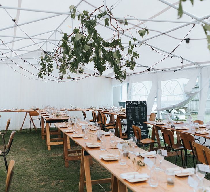 Marquee Reception with Wood, Greenery & Festoon Light Decor | Outdoor Coastal Wedding at Ohawini Bay in New Zealand with Natural Garden Party Reception | Miss Gen Photography