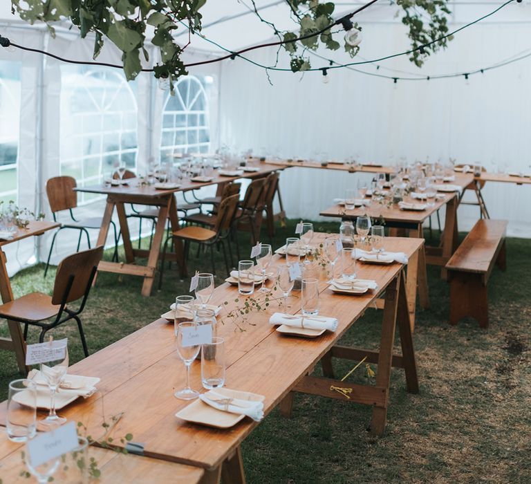 Marquee Reception with Wood, Greenery & Festoon Light Decor | Outdoor Coastal Wedding at Ohawini Bay in New Zealand with Natural Garden Party Reception | Miss Gen Photography