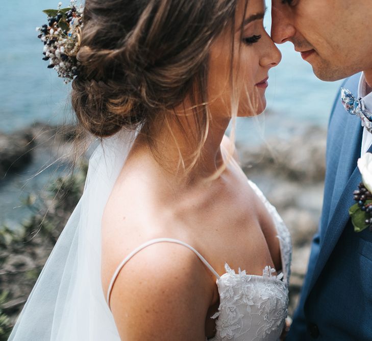 Bride in Estelle Sally Eagle Gown | Groom in Grey Chinos & Navy Blazer | Outdoor Coastal Wedding at Ohawini Bay in New Zealand with Natural Garden Party Reception | Miss Gen Photography