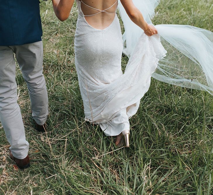 Bride in Estelle Sally Eagle Gown | Outdoor Coastal Wedding at Ohawini Bay in New Zealand with Natural Garden Party Reception | Miss Gen Photography