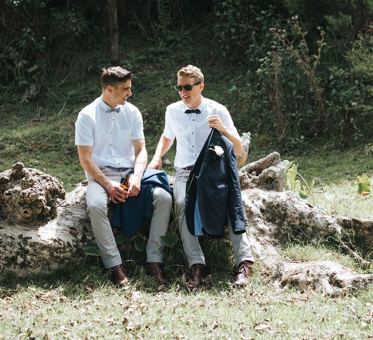 Groomsmen in Grey Chinos & Navy Blazers | Outdoor Coastal Wedding at Ohawini Bay in New Zealand with Natural Garden Party Reception | Miss Gen Photography