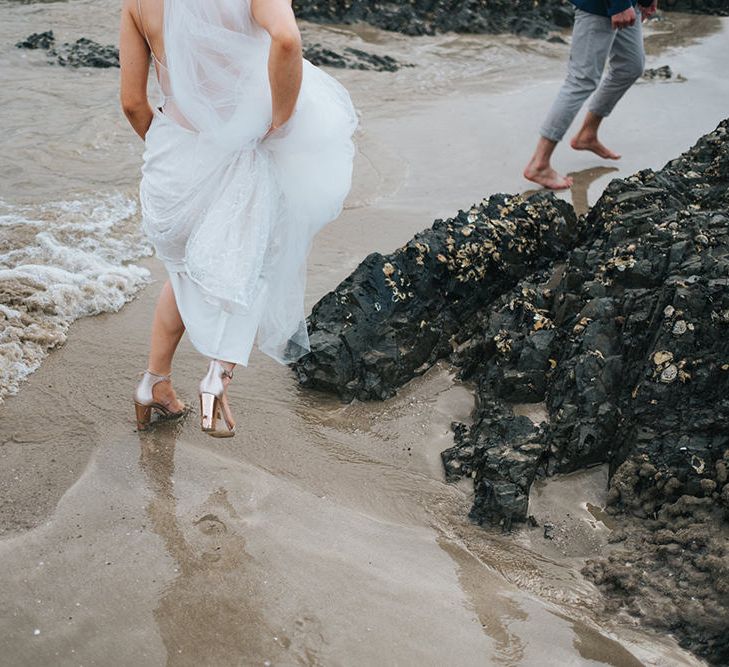 Bride in Estelle Sally Eagle Gown | Groom in Chinos & Blazer | Outdoor Coastal Wedding at Ohawini Bay in New Zealand with Natural Garden Party Reception | Miss Gen Photography