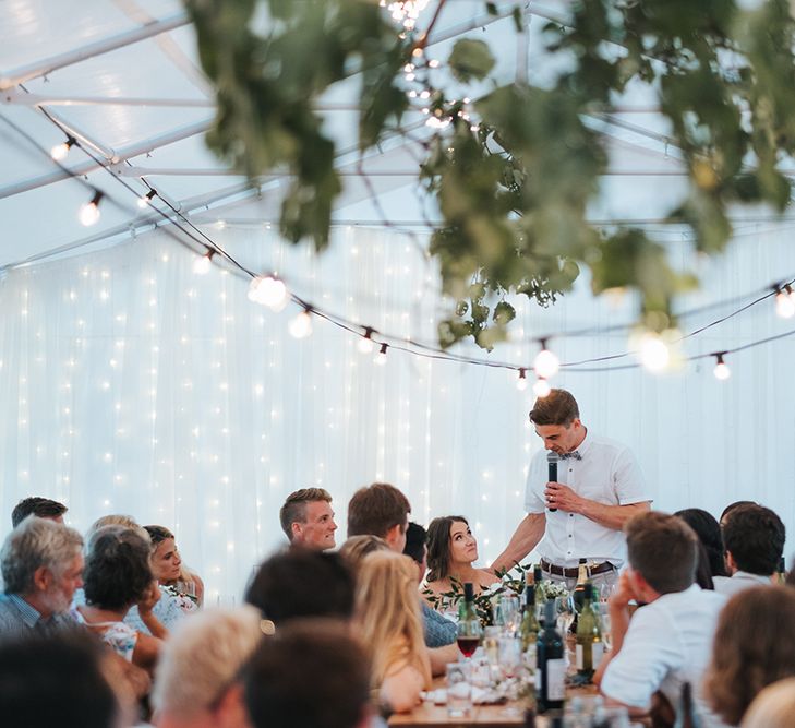 Marquee Reception with Wood, Greenery & Festoon Light Decor | Outdoor Coastal Wedding at Ohawini Bay in New Zealand with Natural Garden Party Reception | Miss Gen Photography