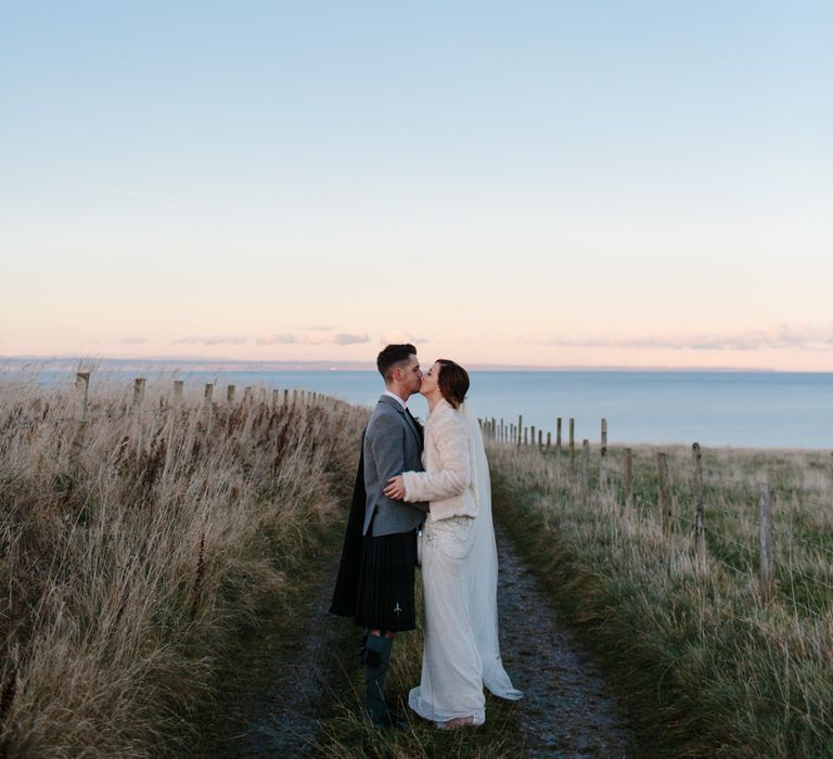 Bride in Jenny Packham Esme Gown & Groom in Traditional Scottish Tartan Kilt