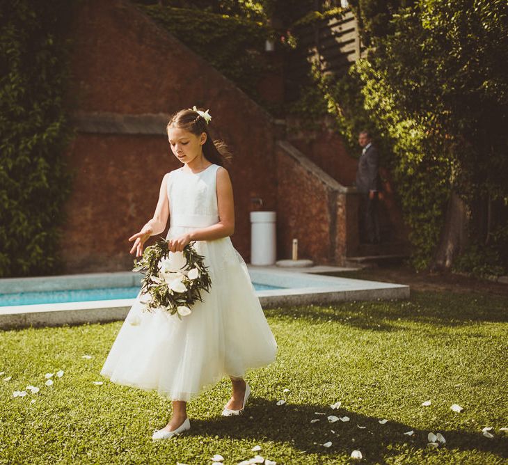 Flower Girl in Monsoon Dress | Wedding Ceremony | Outdoor Destination Wedding at Villa Regina Teodolinda, Lake Como, Italy | Matt Penberthy Photography